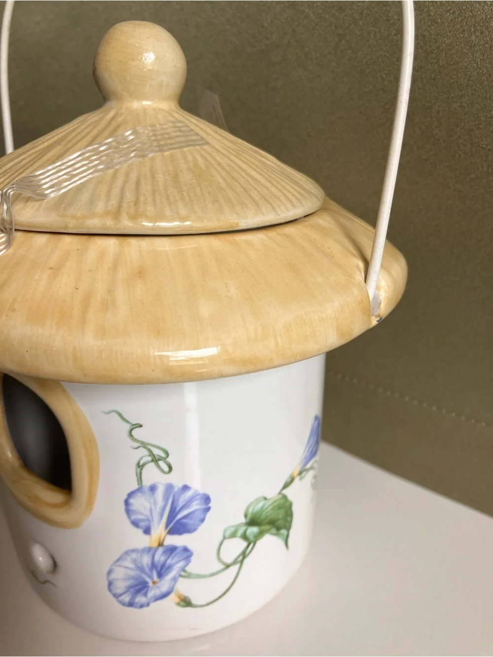 Ceramic Birdhouse with Yellow Roof and Blue Floral Design